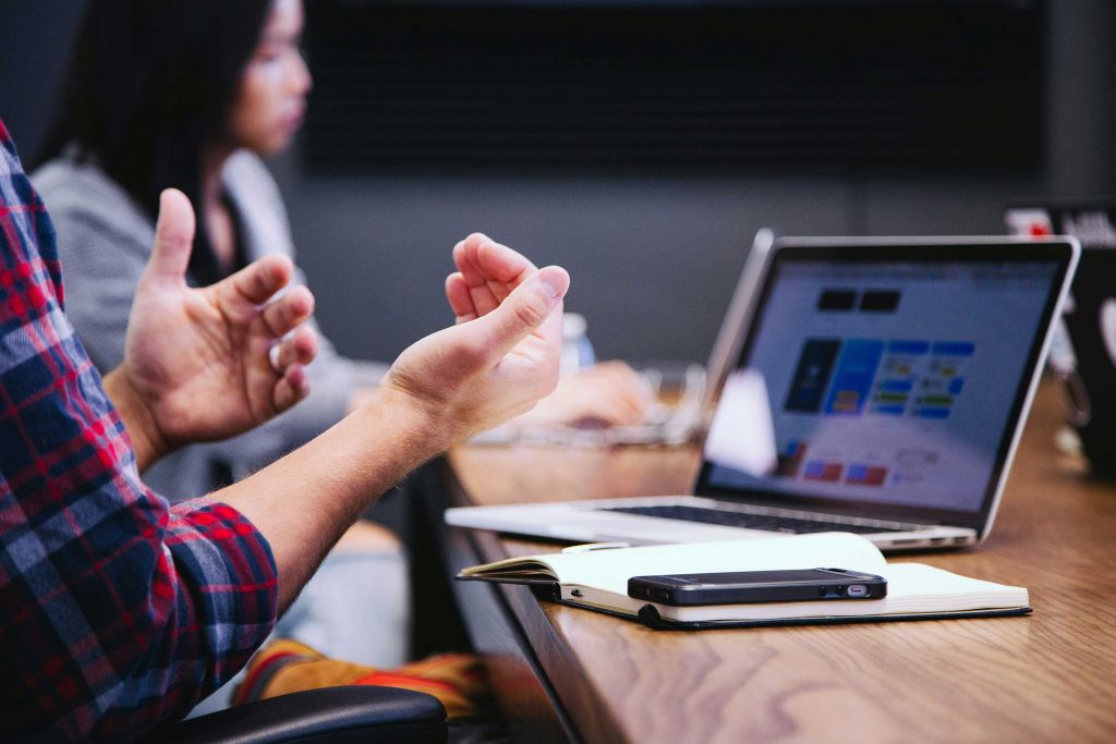 Service-based business professionals discussing their marketing strategy